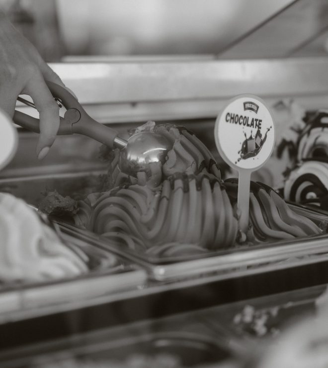 Hand scooping chocolate ice cream at GAL Split