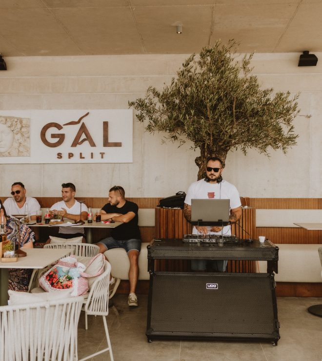 Guests enjoying live DJ music on the terrace at GAL Split