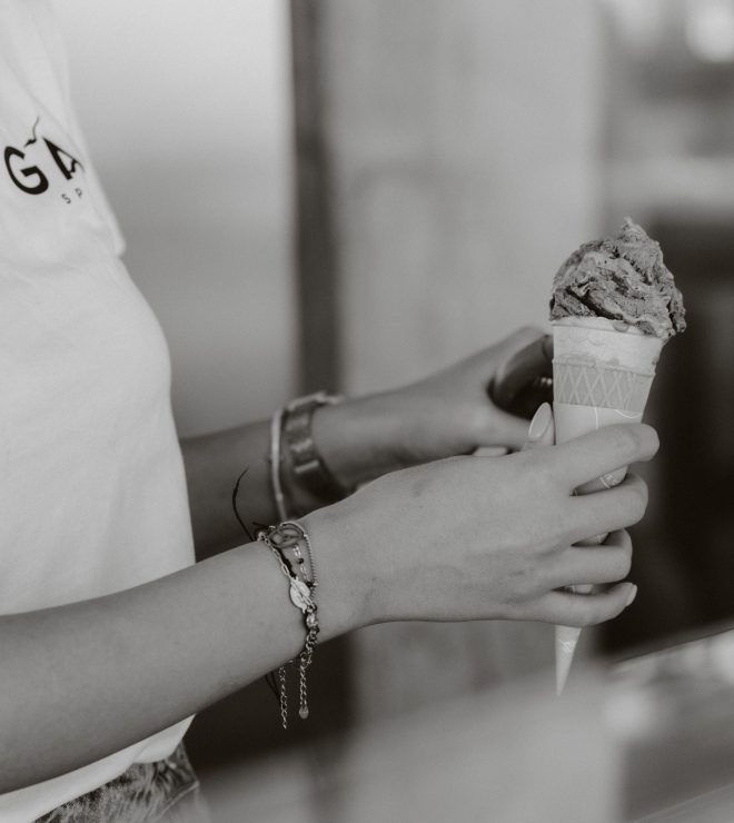 Staff member holding a fresh ice cream cone at Gal Split